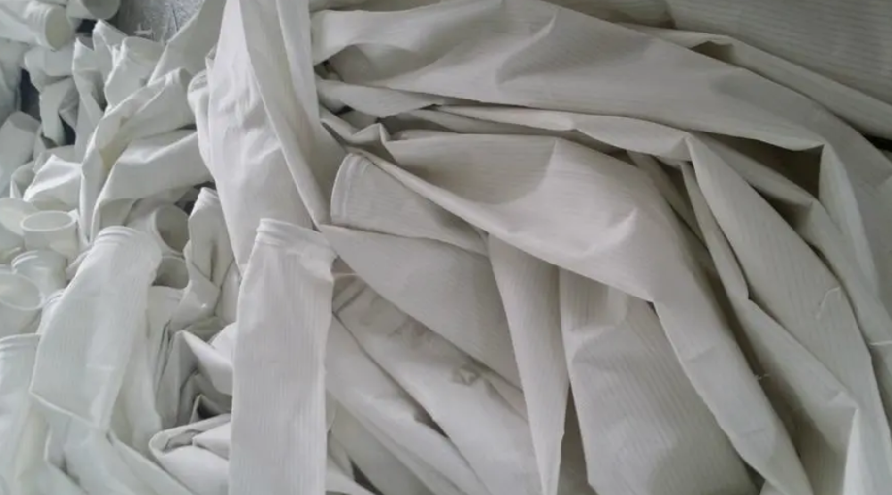 除塵濾袋燒毛軋光技術(shù)原理